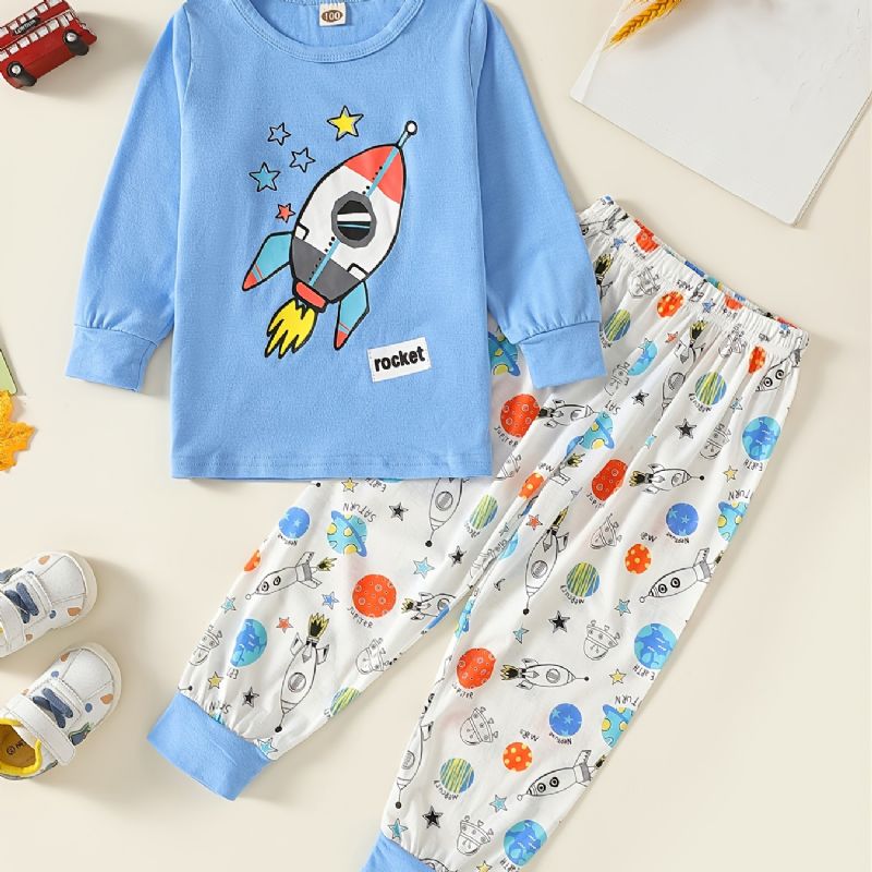 Pojan Pyöreäkaula-sarjakuva-rakettikuvioiset Pyjamasetit