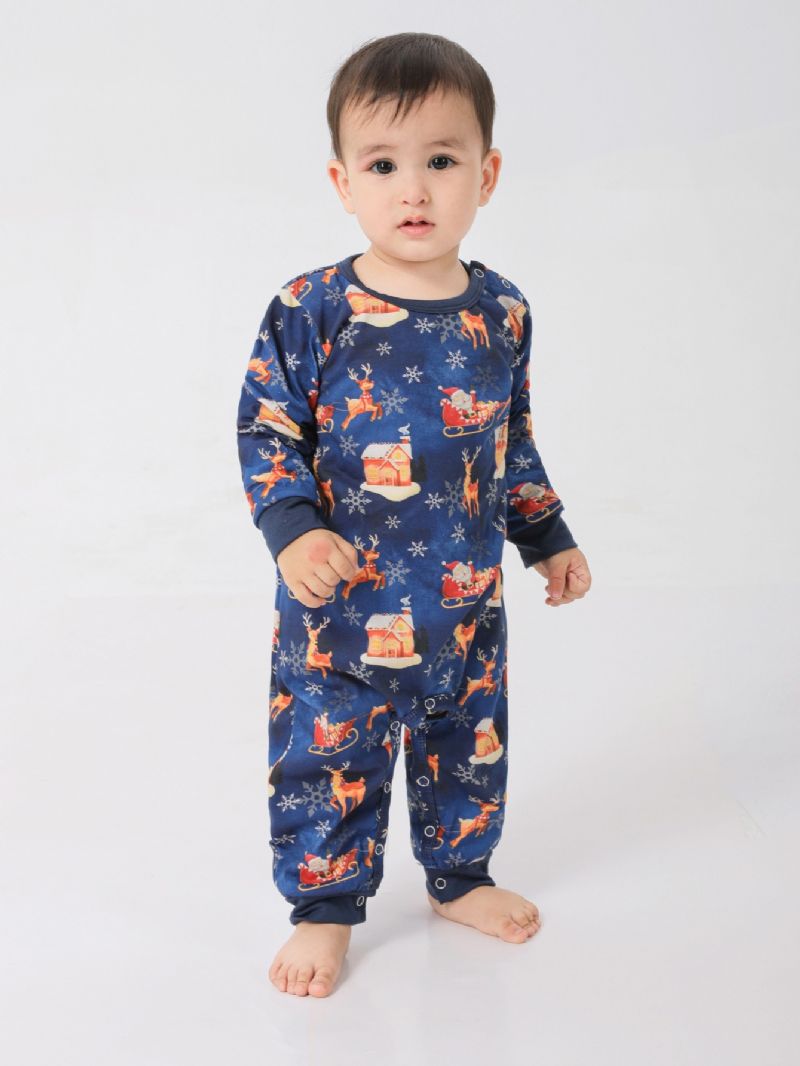 Sarjakuva Santa Elk House Pattern Joulupyjamat Perhepyjamat